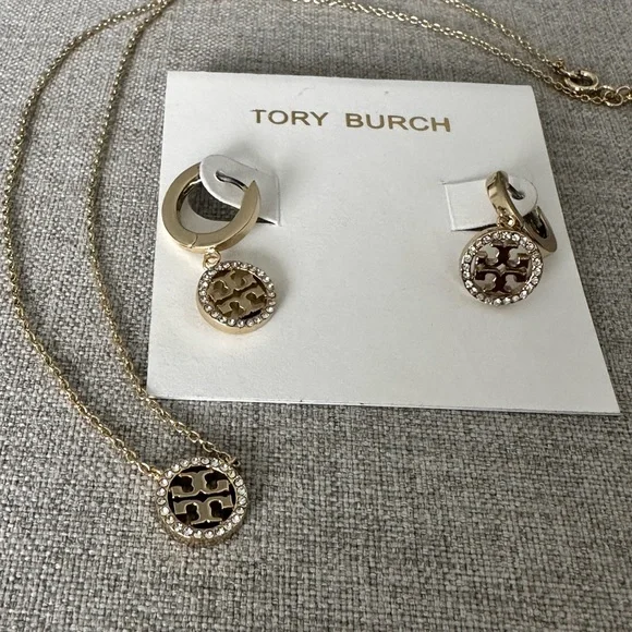 Tory Burch earrings and necklace set. Gold